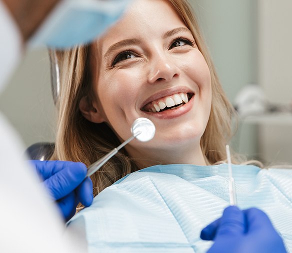 Woman receiving preventive dental checkup